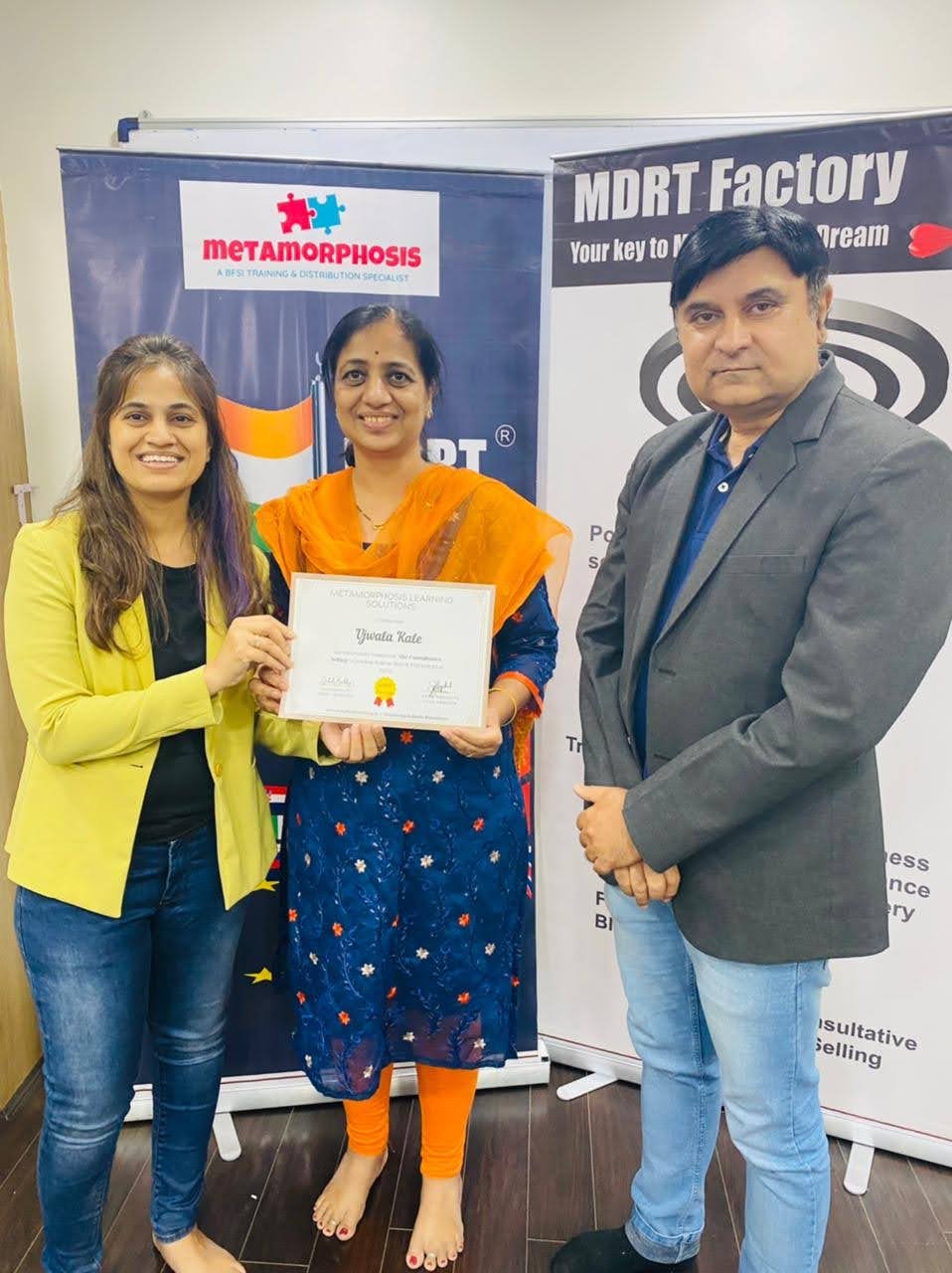 Ujwala Kale receiving a professional learning certificate